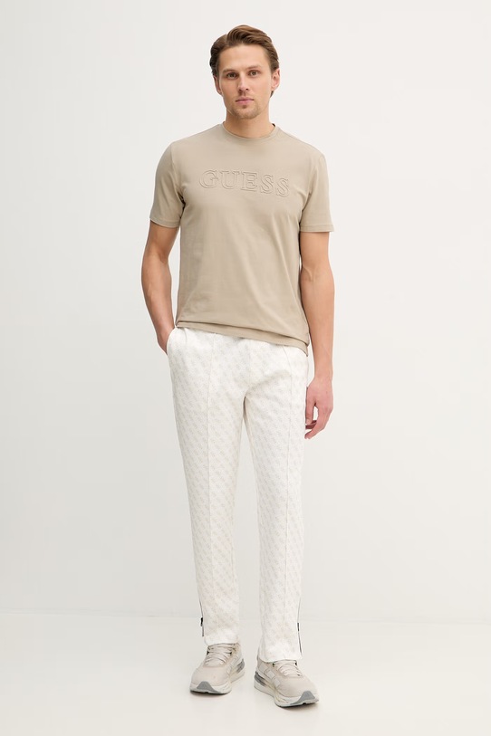 Guess spodnie dresowe KORBIN Z2BB05.K7122 beżowy SS26