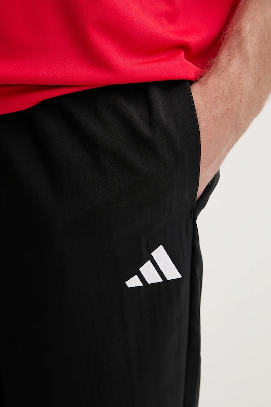 Tepláky adidas Essentials čierna JW0560