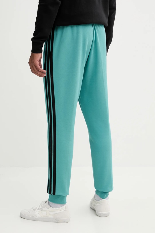 Odzież adidas spodnie dresowe Essentials JX0711 turkusowy