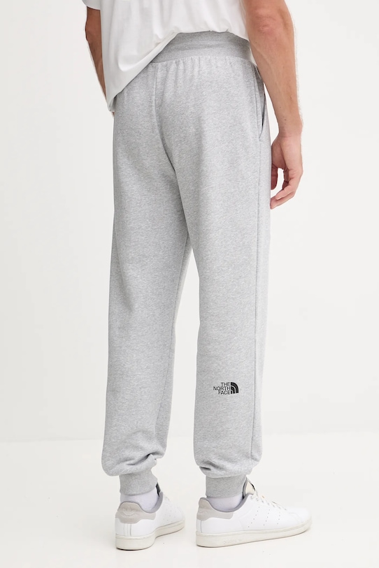 Odzież The North Face spodnie dresowe Fine NF0A8C1KDYX1 szary