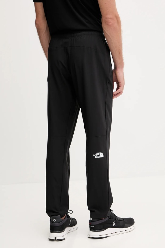 Ρούχα Παντελόνι προπόνησης The North Face NF0A8FJHJK31 μαύρο