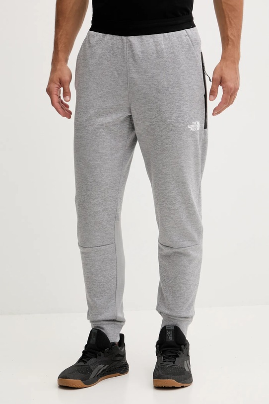 The North Face spodnie treningowe melanż szary NF0A893SEB91