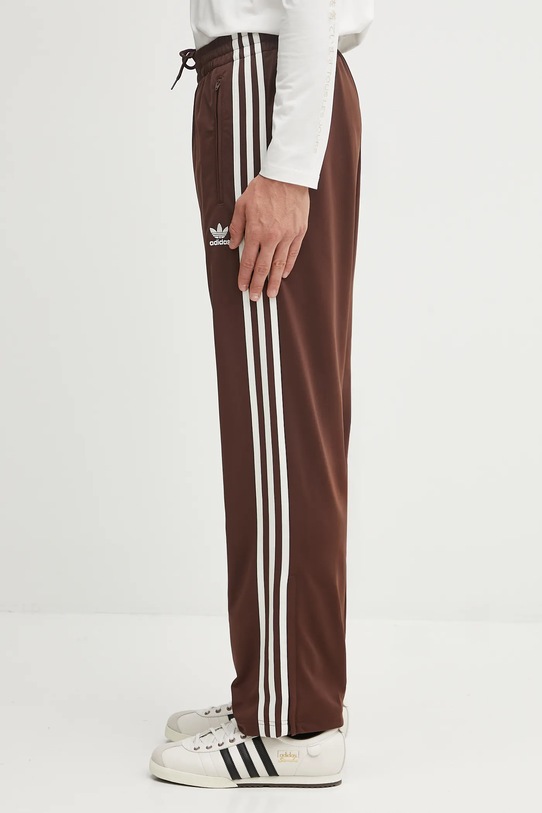 Спортивні штани adidas Originals Firebird Tp трикотаж коричневий KA0482