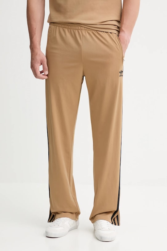 adidas Originals spodnie dresowe Firebird Tp dzianina beżowy JY6369