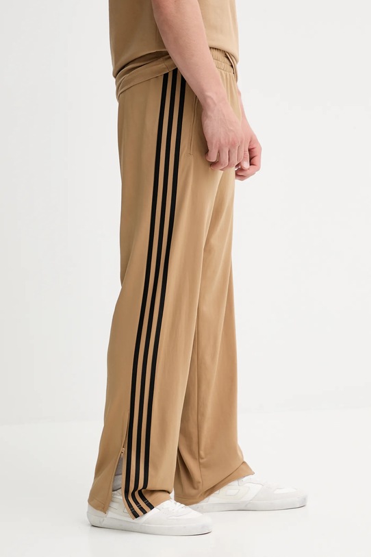 adidas Originals spodnie dresowe Firebird Tp beżowy JY6369