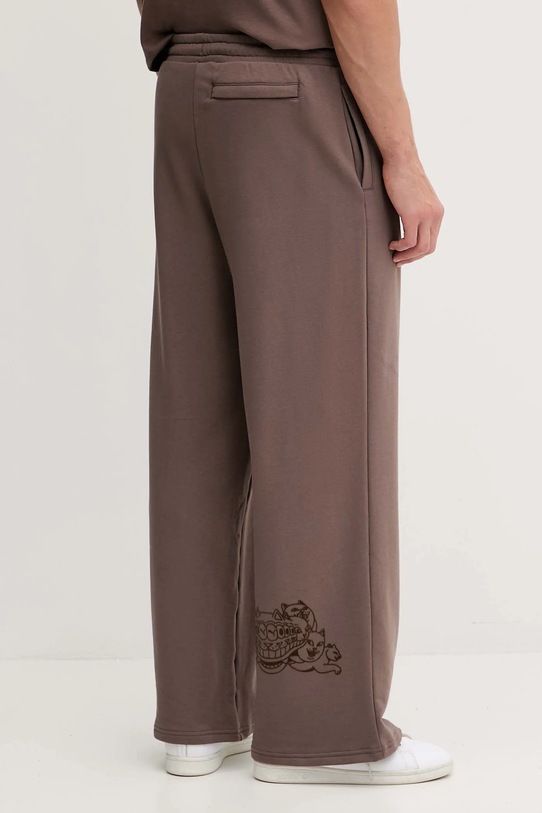 Odjeća Donji dio trenirke Puma x RIPNDIP 632416 smeđa