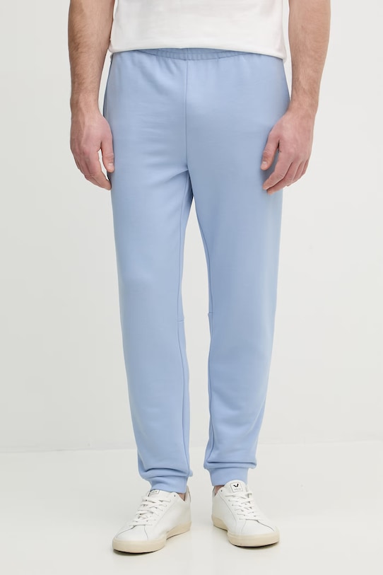 Bavlněné tepláky Lacoste bavlna modrá XH9833