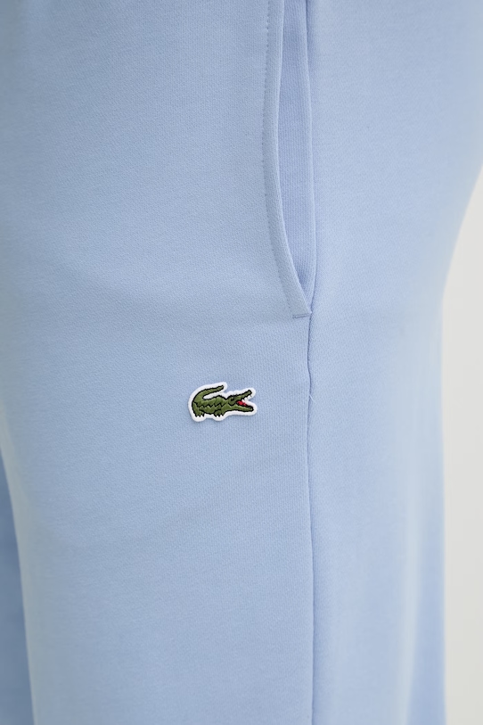 Bavlněné tepláky Lacoste modrá XH9833