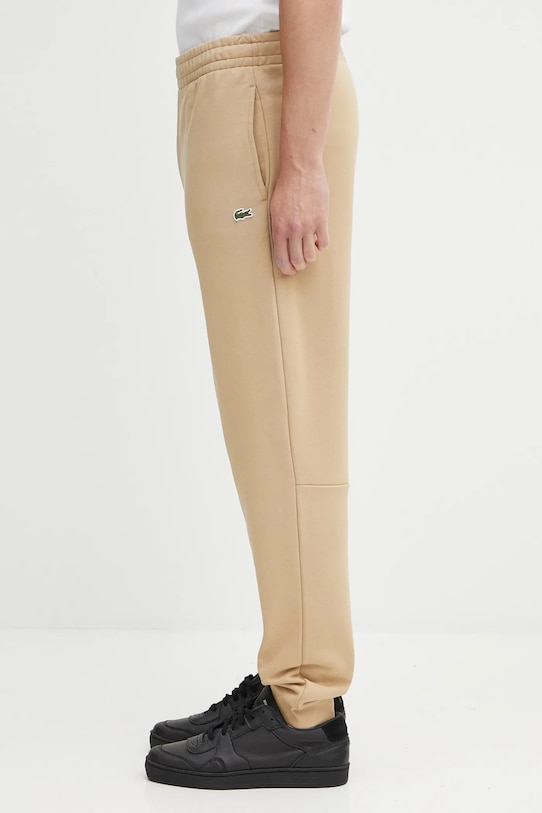 Lacoste spodnie dresowe bawełniane XH9833 beżowy AW25