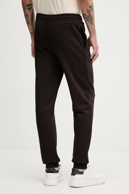 Odzież Lacoste spodnie dresowe bawełniane XH9833 brązowy