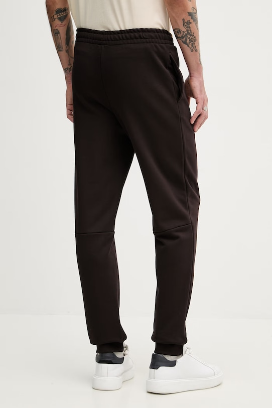 Odzież Lacoste spodnie dresowe bawełniane XH9833 brązowy