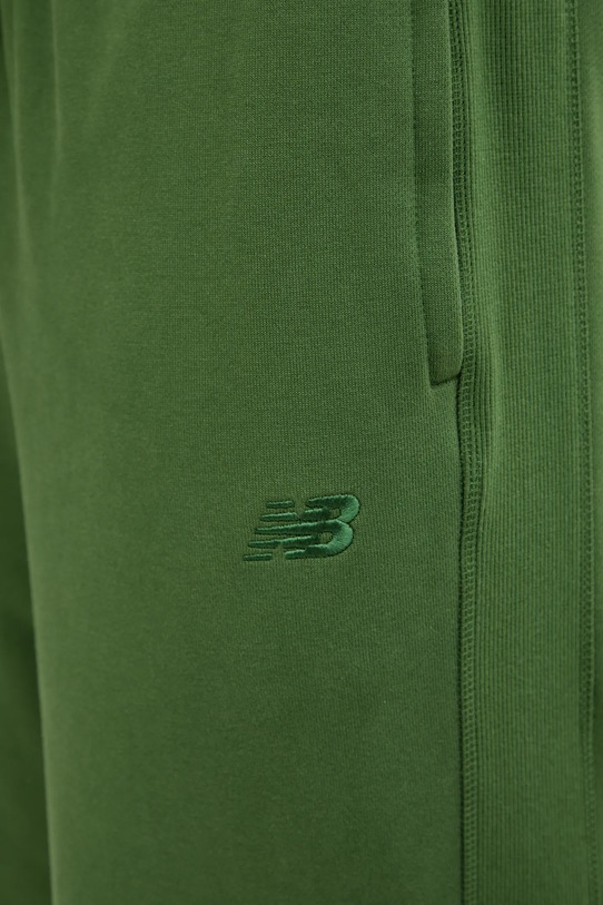 New Balance spodnie dresowe bawełniane zielony MP41508DAE