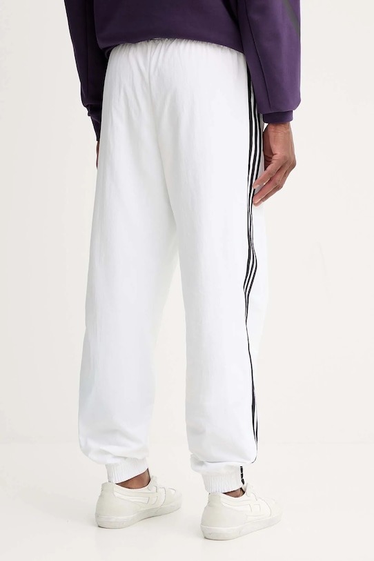Дрехи Спортен панталон adidas Originals Firebird JY1334 бял