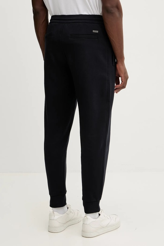 Odzież Armani Exchange spodnie dresowe bawełniane XM001028.AF12656 granatowy