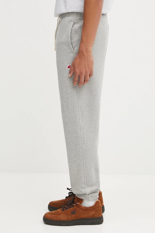 New Balance spodnie dresowe MADE IN USA MP43547AG szary AW25