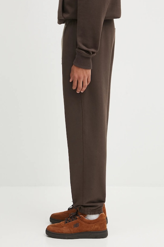 New Balance spodnie dresowe bawełniane MADE IN USA MP43547RHE brązowy AW25