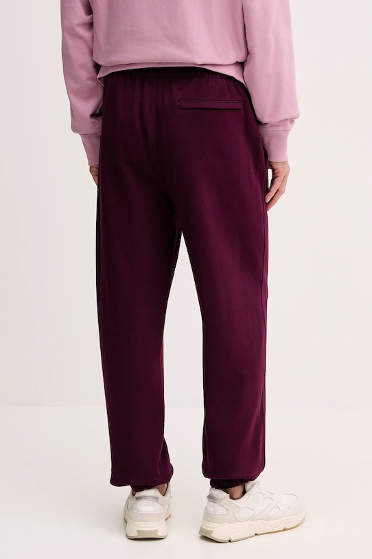 Odzież Calvin Klein Jeans spodnie dresowe LV04RD252G fioletowy