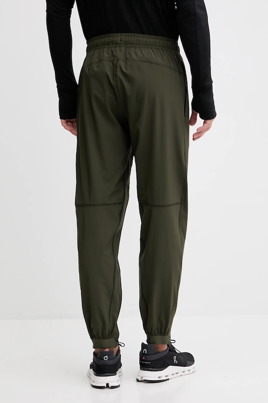 Odzież adidas Performance spodnie treningowe Tr-Es Woven KA7859 zielony