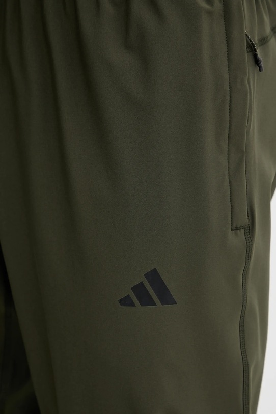 adidas Performance spodnie treningowe Tr-Es Woven zielony KA7859