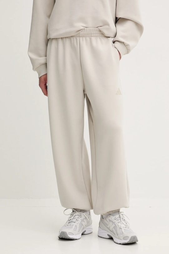 adidas spodnie dresowe Soft Lux z elastanem beżowy KB5691