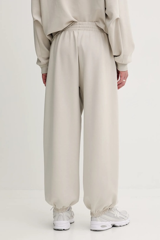 Odzież adidas spodnie dresowe Soft Lux KB5691 beżowy