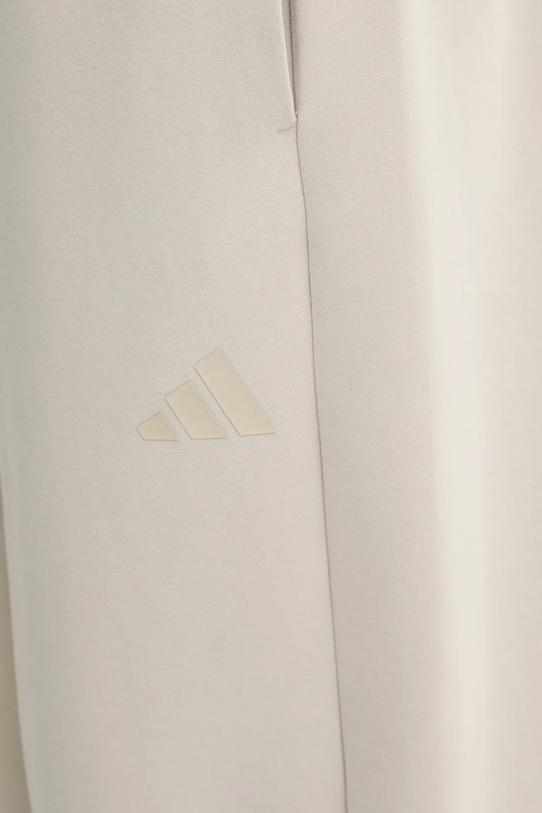 adidas spodnie dresowe Soft Lux beżowy KB5691