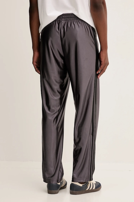 Ruházat adidas Originals melegítőnadrág Firebird Tp JW5959 lila