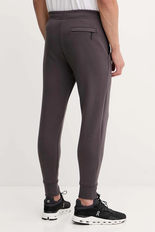 Oblečenie Tréningové nohavice On Focus Tech 1MF30320569 fialová