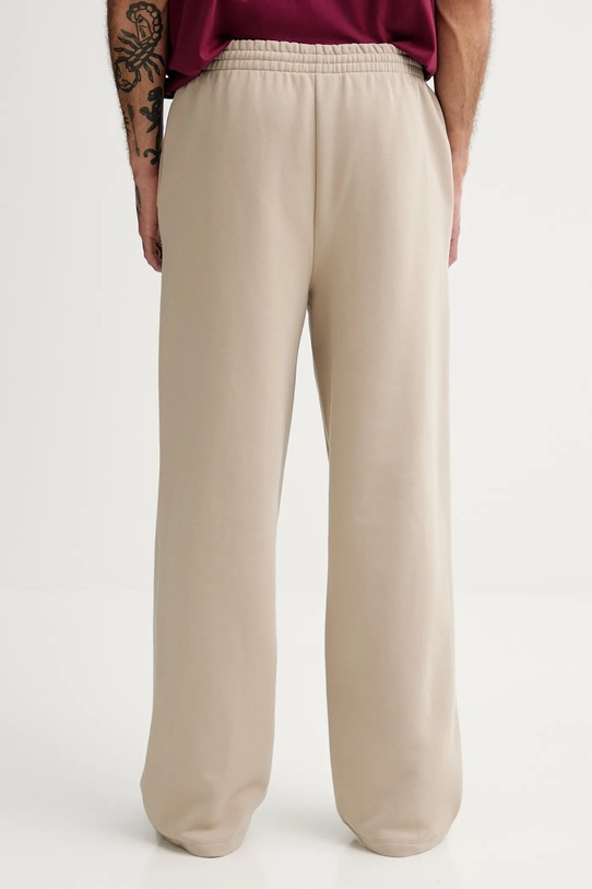 Pangaia spodnie dresowe bawełniane beżowy 10002676.