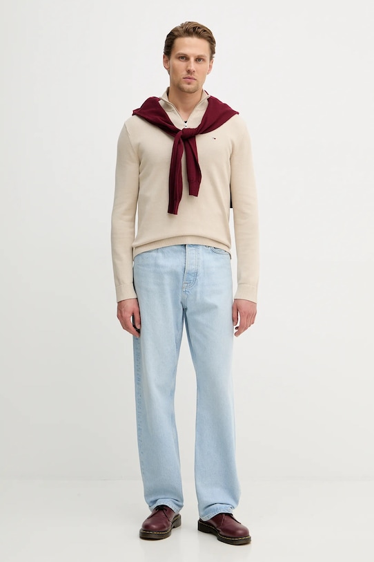 Bombažen pulover Tommy Jeans DM0DM21654 bež SS26