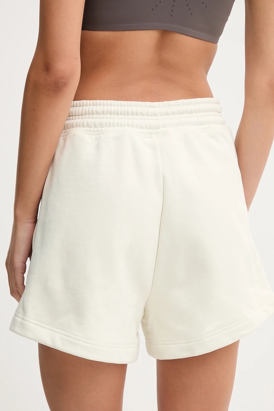 Odzież adidas by Stella McCartney szorty treningowe JX6786 beżowy