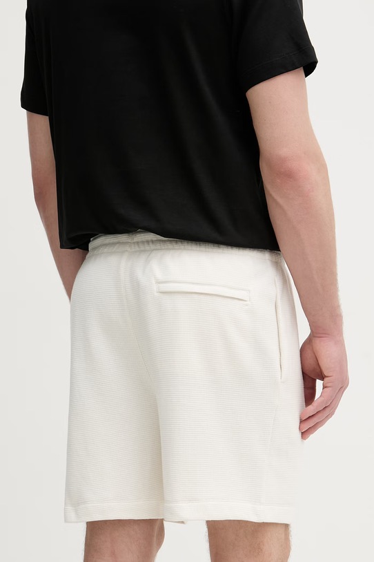 Oblečenie Calvin Klein Jeans teplákové šortky pánske bavlnené LV04RC248G béžová