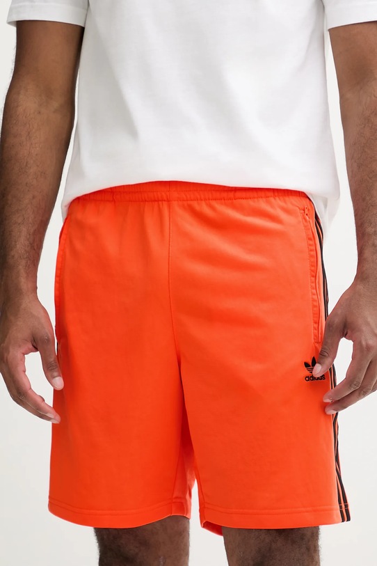 Къс панталон adidas Originals Firebird трикотаж оранжев JY1344