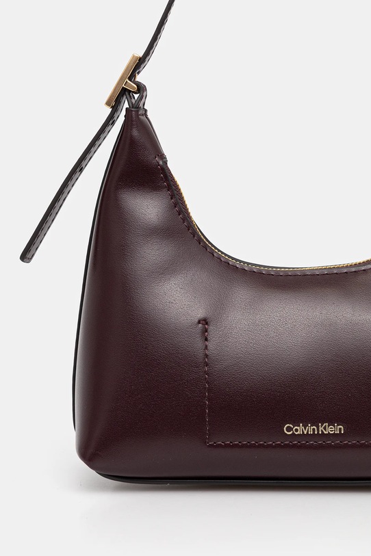Akcesoria Calvin Klein torebka skórzana LV04F3263G fioletowy