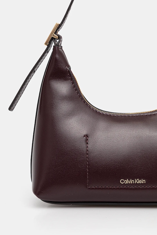 Akcesoria Calvin Klein torebka skórzana LV04F3263G fioletowy