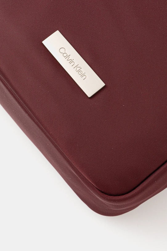 Calvin Klein saszetka bordowy LV04D3180G