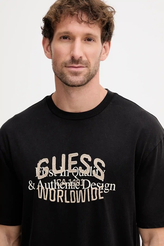 Bavlněné tričko Guess WORLDWIDE černá M5YI49.KBW41