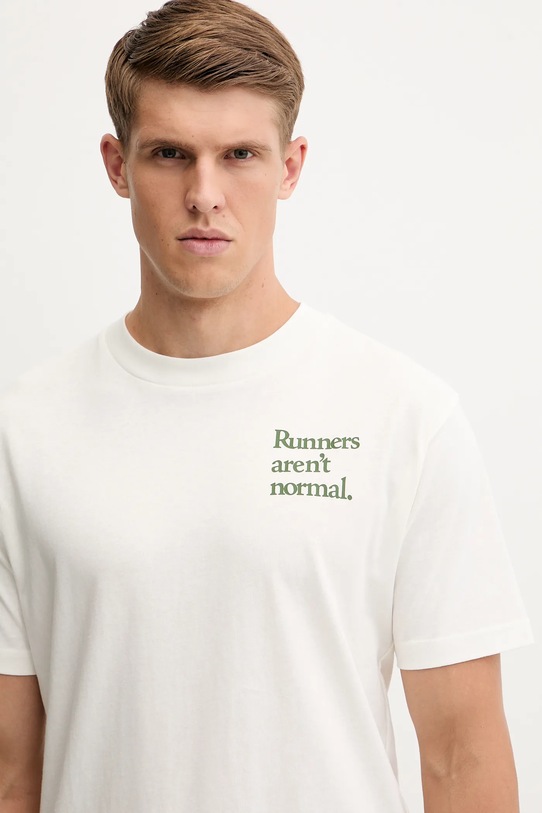 New Balance t-shirt bawełniany beżowy MT53921SST
