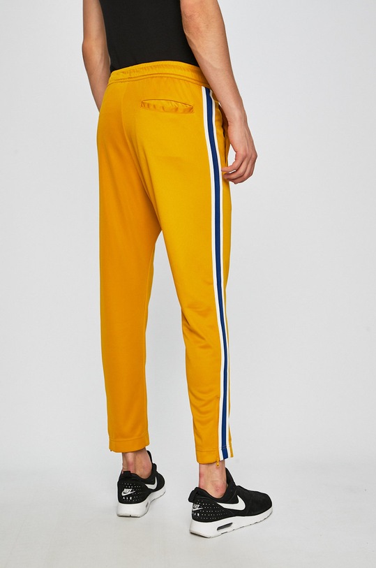 Ruházat Nike - Nadrág C.AR2246.711 sárga