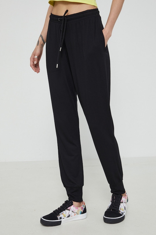 Spodnie dresowe damskie gładkie czarne wzorzyste czarny RS22.SPD0C1