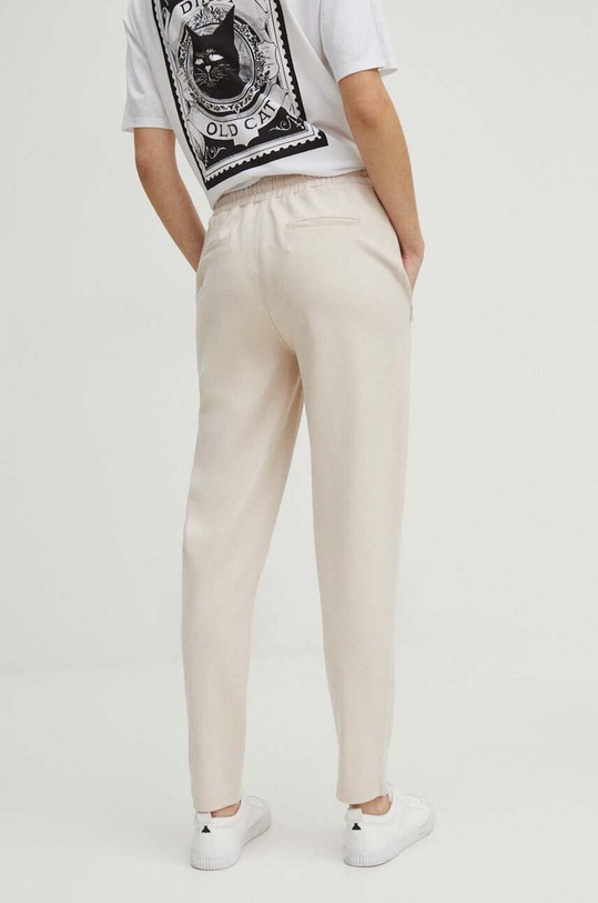 Oblečenie Tepláky dámske béžová farba RS24.SPD041 béžová