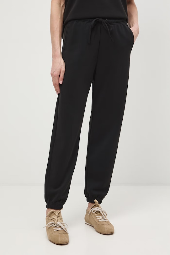 Medicine spodnie dresowe z elastanem czarny RS26-SPD404