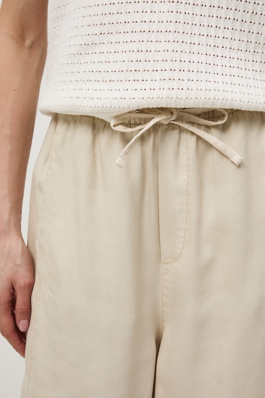 Nohavice slouchy z lyocellu béžová RS26-SPD502
