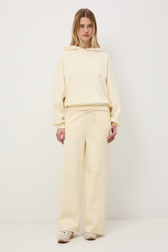 Medicine spodnie dresowe damskie żółty RS26-SPD602