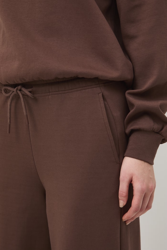 Medicine spodnie dresowe damskie brązowy RS26-SPD602