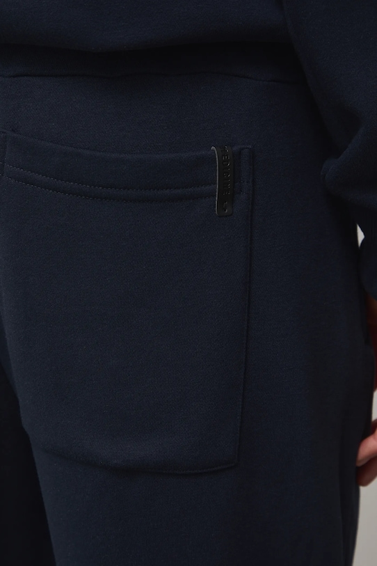 Tepláky pánské jogger bez vzoru námořnická modř RS26-SPM011