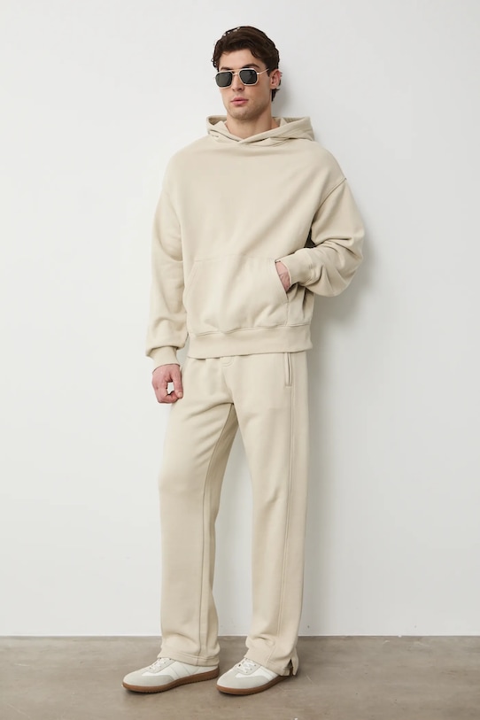 Medicine spodnie dresowe męskie bawełniane beżowy RS26-SPM031