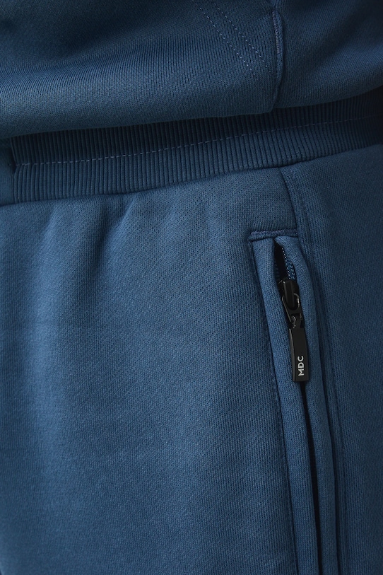 Medicine spodnie dresowe męskie bawełniane granatowy RS26-SPM031