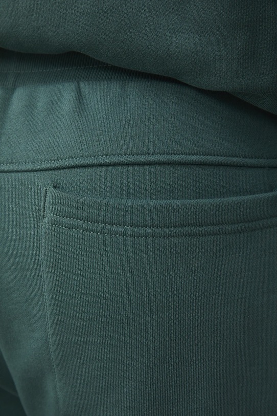 Medicine spodnie dresowe męskie bawełniane zielony RS26-SPM031