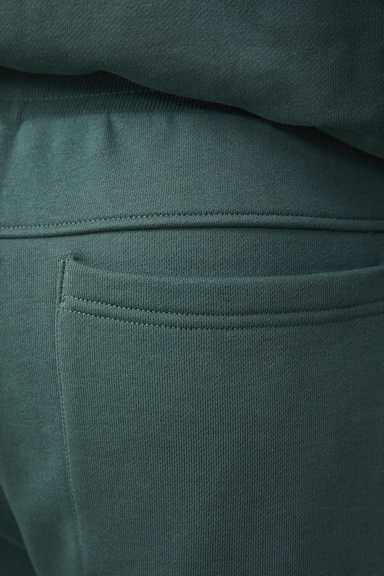 Medicine spodnie dresowe męskie bawełniane zielony RS26-SPM031